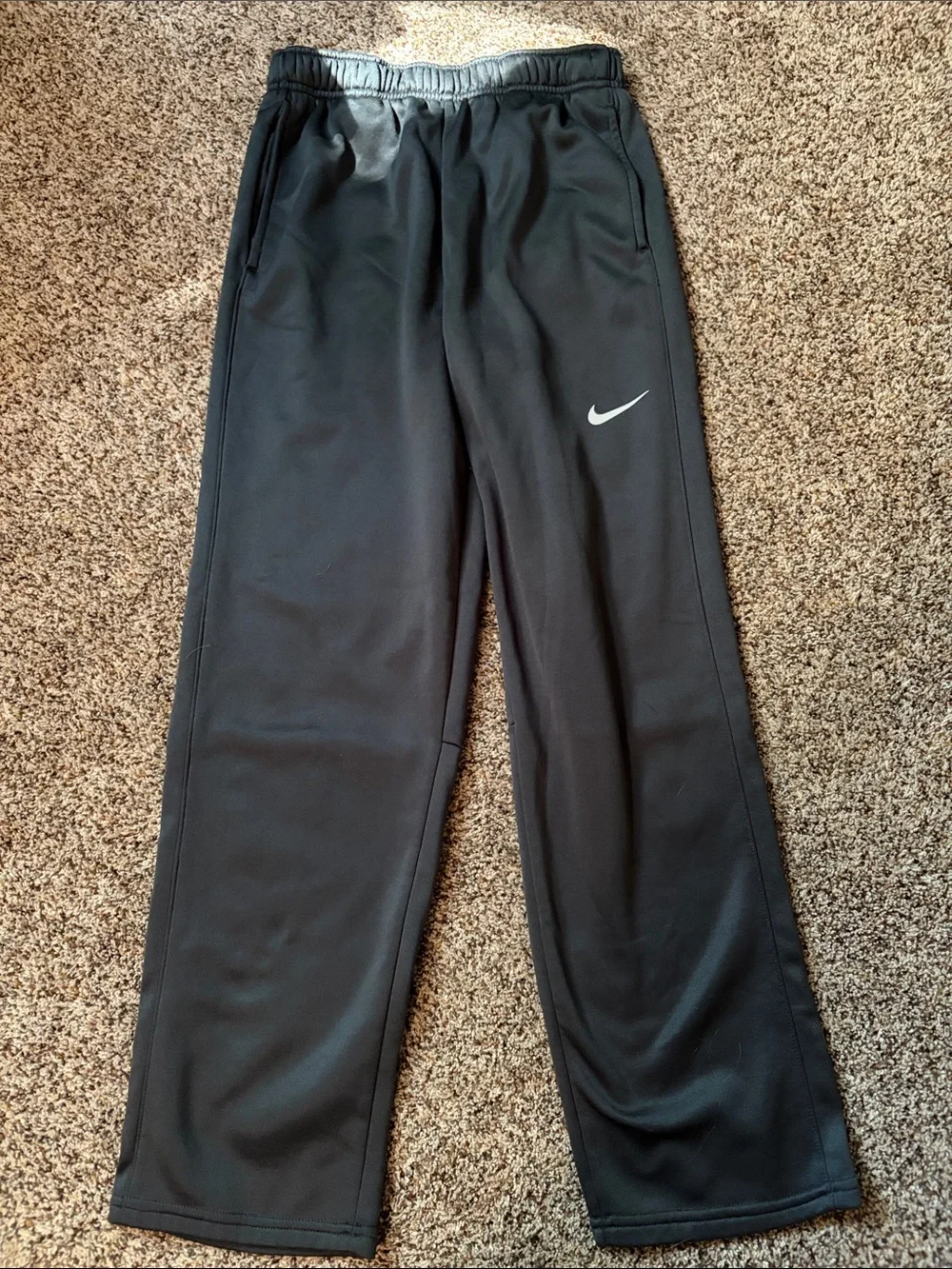Nike dark gray Sweatpants with White Swoosh